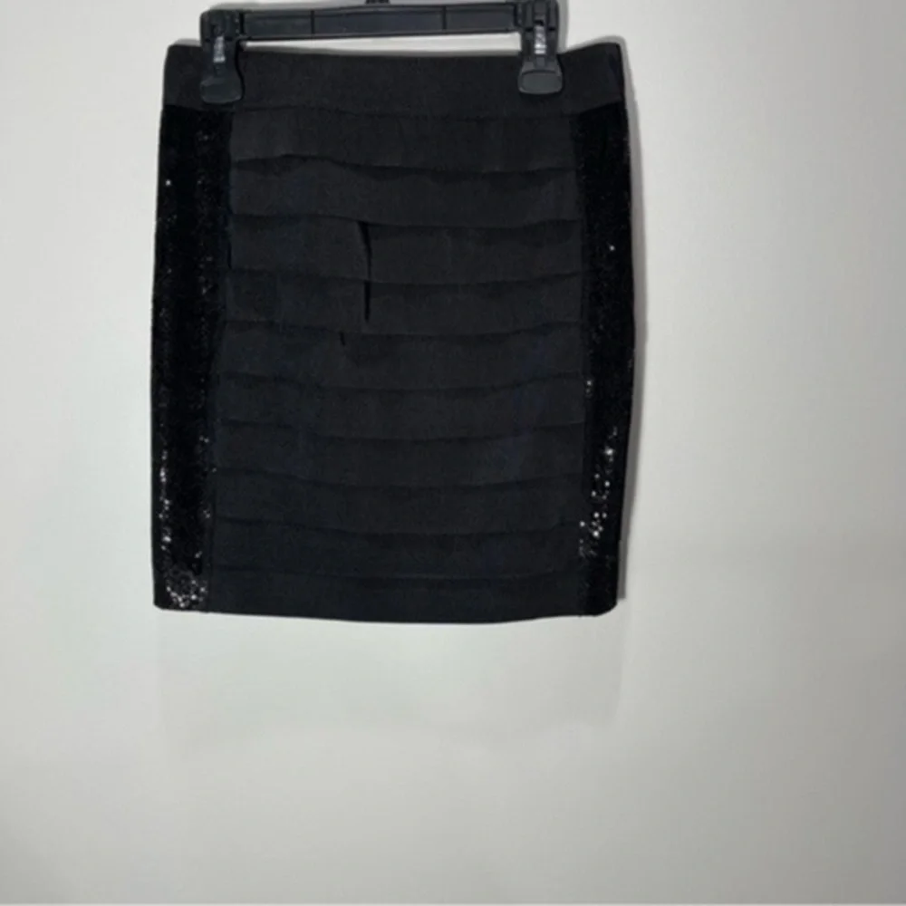 Tory Burch black mini bandage skirt with glitter side panels Size M